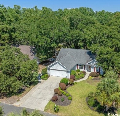 Meticulously maintained 3-bedroom, 2-bathroom home, perfectly on Pawleys Plantation Golf and Country Club in South Carolina - for sale on GolfHomes.com, golf home, golf lot