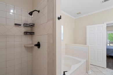 Welcome to this beautifully updated 3-bedroom, 2-bathroom home on Perdido Bay Golf Club in Florida - for sale on GolfHomes.com, golf home, golf lot