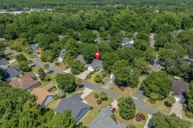 Meticulously maintained 3-bedroom, 2-bathroom home, perfectly on Pawleys Plantation Golf and Country Club in South Carolina - for sale on GolfHomes.com, golf home, golf lot