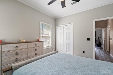Welcome to this beautifully updated 3-bedroom, 2-bathroom home on Perdido Bay Golf Club in Florida - for sale on GolfHomes.com, golf home, golf lot