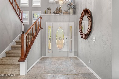 Stylish & Contemporary.  Located in Spruce Creek Fly-In's on Spruce Creek Golf Club in Florida - for sale on GolfHomes.com, golf home, golf lot