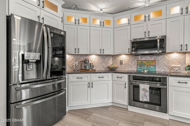 Stylish & Contemporary.  Located in Spruce Creek Fly-In's on Spruce Creek Golf Club in Florida - for sale on GolfHomes.com, golf home, golf lot