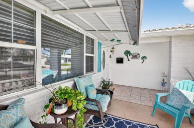 Spacious 2BR/2BA on Large Corner Lot in Leisureville! Bright and on Leisureville Community Golf Course in Florida - for sale on GolfHomes.com, golf home, golf lot