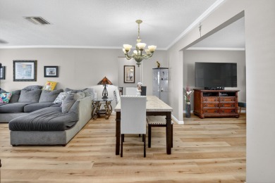 Spacious 2BR/2BA on Large Corner Lot in Leisureville! Bright and on Leisureville Community Golf Course in Florida - for sale on GolfHomes.com, golf home, golf lot