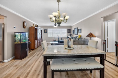 Spacious 2BR/2BA on Large Corner Lot in Leisureville! Bright and on Leisureville Community Golf Course in Florida - for sale on GolfHomes.com, golf home, golf lot