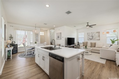The spacious primary bedroom is on the main level. This is on Hoakalei Country Club At Ocean Pointe in Hawaii - for sale on GolfHomes.com, golf home, golf lot