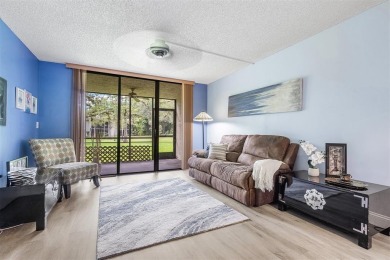 DRASTICALLY REDUCED! ESTATE SALE, This in-demand first floor 2 on Woodmont Country Club in Florida - for sale on GolfHomes.com, golf home, golf lot