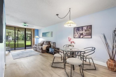 DRASTICALLY REDUCED! ESTATE SALE, This in-demand first floor 2 on Woodmont Country Club in Florida - for sale on GolfHomes.com, golf home, golf lot