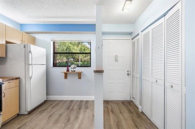 DRASTICALLY REDUCED! ESTATE SALE, This in-demand first floor 2 on Woodmont Country Club in Florida - for sale on GolfHomes.com, golf home, golf lot