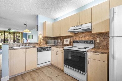 DRASTICALLY REDUCED! ESTATE SALE, This in-demand first floor 2 on Woodmont Country Club in Florida - for sale on GolfHomes.com, golf home, golf lot