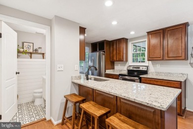 Some homes are made for living, and some are made for living on Bay Hills Golf Club in Maryland - for sale on GolfHomes.com, golf home, golf lot