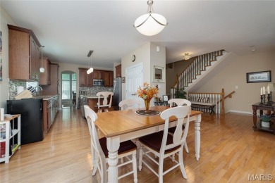 STUNNING 1.5 story villa overlooking the 8th green of on Winghaven Country Club in Missouri - for sale on GolfHomes.com, golf home, golf lot