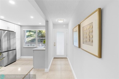 Absolutely Stunning Remodel! Feel the Luxury at the prestigious on Wynmoor Golf Course in Florida - for sale on GolfHomes.com, golf home, golf lot
