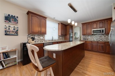 STUNNING 1.5 story villa overlooking the 8th green of on Winghaven Country Club in Missouri - for sale on GolfHomes.com, golf home, golf lot