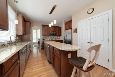 STUNNING 1.5 story villa overlooking the 8th green of on Winghaven Country Club in Missouri - for sale on GolfHomes.com, golf home, golf lot