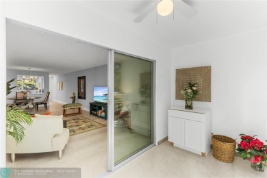 Absolutely Stunning Remodel! Feel the Luxury at the prestigious on Wynmoor Golf Course in Florida - for sale on GolfHomes.com, golf home, golf lot