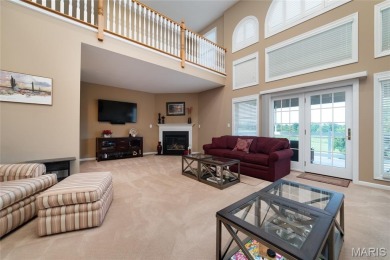 STUNNING 1.5 story villa overlooking the 8th green of on Winghaven Country Club in Missouri - for sale on GolfHomes.com, golf home, golf lot