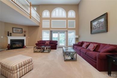 STUNNING 1.5 story villa overlooking the 8th green of on Winghaven Country Club in Missouri - for sale on GolfHomes.com, golf home, golf lot