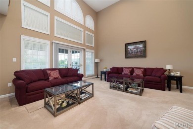 STUNNING 1.5 story villa overlooking the 8th green of on Winghaven Country Club in Missouri - for sale on GolfHomes.com, golf home, golf lot
