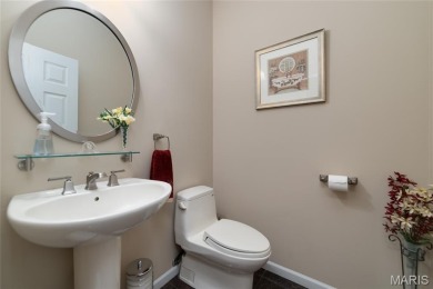 STUNNING 1.5 story villa overlooking the 8th green of on Winghaven Country Club in Missouri - for sale on GolfHomes.com, golf home, golf lot