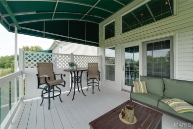 STUNNING 1.5 story villa overlooking the 8th green of on Winghaven Country Club in Missouri - for sale on GolfHomes.com, golf home, golf lot