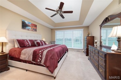 STUNNING 1.5 story villa overlooking the 8th green of on Winghaven Country Club in Missouri - for sale on GolfHomes.com, golf home, golf lot