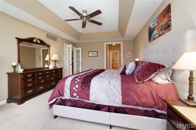 STUNNING 1.5 story villa overlooking the 8th green of on Winghaven Country Club in Missouri - for sale on GolfHomes.com, golf home, golf lot