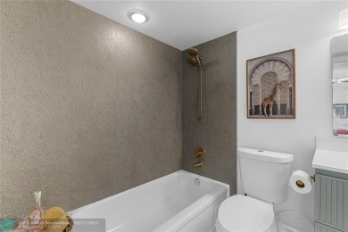Absolutely Stunning Remodel! Feel the Luxury at the prestigious on Wynmoor Golf Course in Florida - for sale on GolfHomes.com, golf home, golf lot