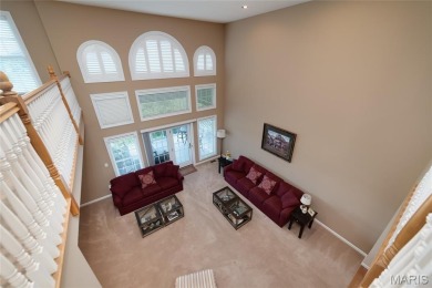 STUNNING 1.5 story villa overlooking the 8th green of on Winghaven Country Club in Missouri - for sale on GolfHomes.com, golf home, golf lot