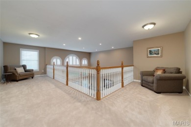 STUNNING 1.5 story villa overlooking the 8th green of on Winghaven Country Club in Missouri - for sale on GolfHomes.com, golf home, golf lot