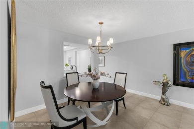Absolutely Stunning Remodel! Feel the Luxury at the prestigious on Wynmoor Golf Course in Florida - for sale on GolfHomes.com, golf home, golf lot