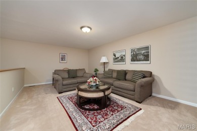 STUNNING 1.5 story villa overlooking the 8th green of on Winghaven Country Club in Missouri - for sale on GolfHomes.com, golf home, golf lot