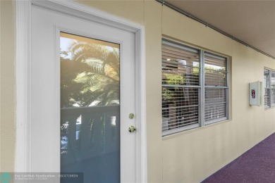 Absolutely Stunning Remodel! Feel the Luxury at the prestigious on Wynmoor Golf Course in Florida - for sale on GolfHomes.com, golf home, golf lot