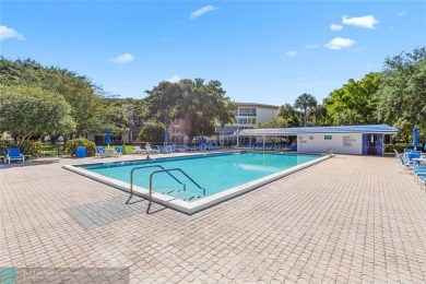 Absolutely Stunning Remodel! Feel the Luxury at the prestigious on Wynmoor Golf Course in Florida - for sale on GolfHomes.com, golf home, golf lot