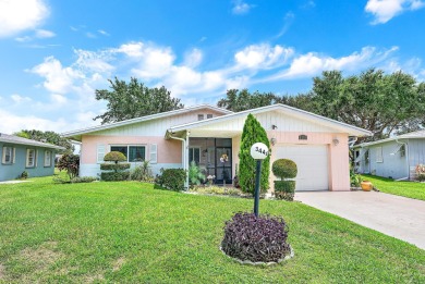 Welcome to this charming 2-bedroom, 2-bathroom home located in a on Cypress Lakes Golf Course - West Palm Beach in Florida - for sale on GolfHomes.com, golf home, golf lot