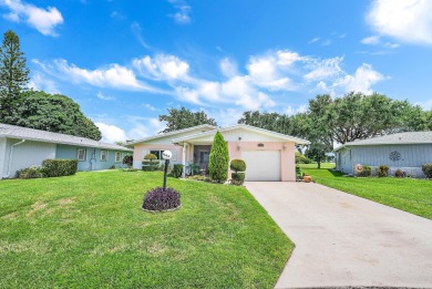 Welcome to this charming 2-bedroom, 2-bathroom home located in a on Cypress Lakes Golf Course - West Palm Beach in Florida - for sale on GolfHomes.com, golf home, golf lot