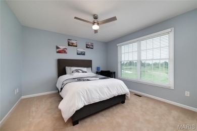 STUNNING 1.5 story villa overlooking the 8th green of on Winghaven Country Club in Missouri - for sale on GolfHomes.com, golf home, golf lot