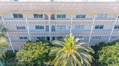 Absolutely Stunning Remodel! Feel the Luxury at the prestigious on Wynmoor Golf Course in Florida - for sale on GolfHomes.com, golf home, golf lot