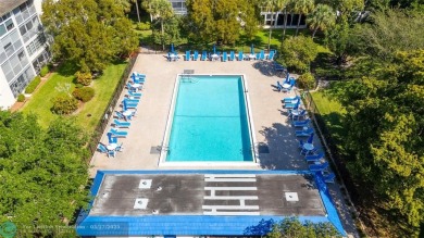 Absolutely Stunning Remodel! Feel the Luxury at the prestigious on Wynmoor Golf Course in Florida - for sale on GolfHomes.com, golf home, golf lot