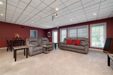 STUNNING 1.5 story villa overlooking the 8th green of on Winghaven Country Club in Missouri - for sale on GolfHomes.com, golf home, golf lot