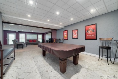 STUNNING 1.5 story villa overlooking the 8th green of on Winghaven Country Club in Missouri - for sale on GolfHomes.com, golf home, golf lot