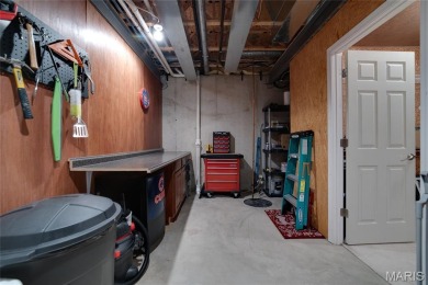 STUNNING 1.5 story villa overlooking the 8th green of on Winghaven Country Club in Missouri - for sale on GolfHomes.com, golf home, golf lot