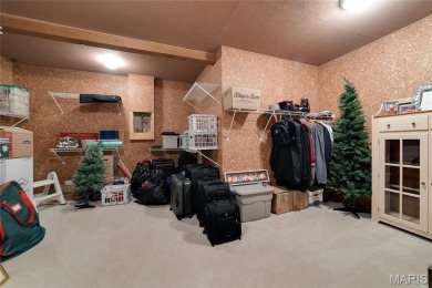 STUNNING 1.5 story villa overlooking the 8th green of on Winghaven Country Club in Missouri - for sale on GolfHomes.com, golf home, golf lot