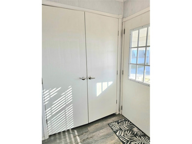 Welcome to this meticulously maintained corner property in on Saint Andrews South Golf Club in Florida - for sale on GolfHomes.com, golf home, golf lot