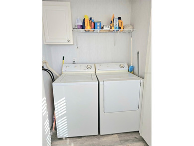 Welcome to this meticulously maintained corner property in on Saint Andrews South Golf Club in Florida - for sale on GolfHomes.com, golf home, golf lot