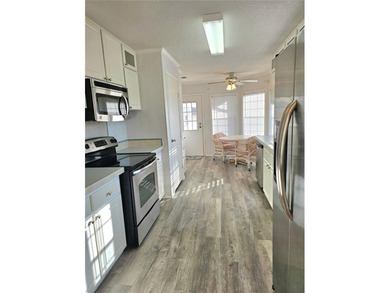 Welcome to this meticulously maintained corner property in on Saint Andrews South Golf Club in Florida - for sale on GolfHomes.com, golf home, golf lot