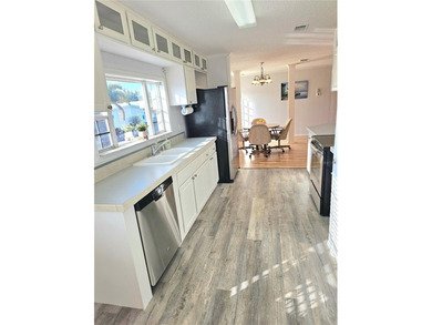 Welcome to this meticulously maintained corner property in on Saint Andrews South Golf Club in Florida - for sale on GolfHomes.com, golf home, golf lot