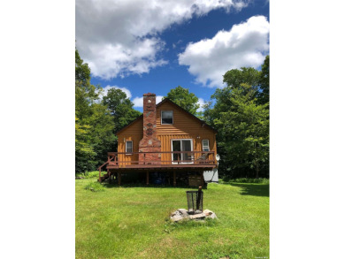 Great 4 Bedroom Cabin with Full Basement w/ OSE. Two Full Baths on Tennanah Lake Golf and Tennis in New York - for sale on GolfHomes.com, golf home, golf lot