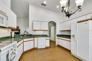 Welcome to this beautifully maintained 2-bedroom, 2-bath home on Stonegate Golf Club in Florida - for sale on GolfHomes.com, golf home, golf lot