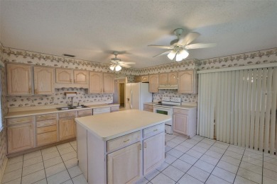 GREAT INVESTMENT OPPORTUNITY - FIXER UPPER IN SUN CITY CENTER! on Caloosa Greens Executive Golf Course in Florida - for sale on GolfHomes.com, golf home, golf lot